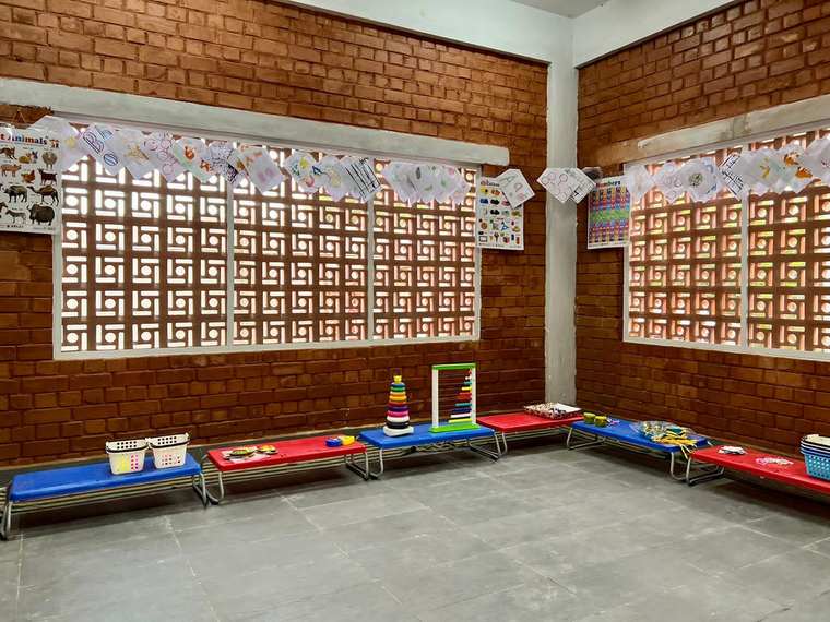 Classroom with reading mats and display boards