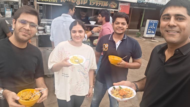 Tablers out together at a street-food stall